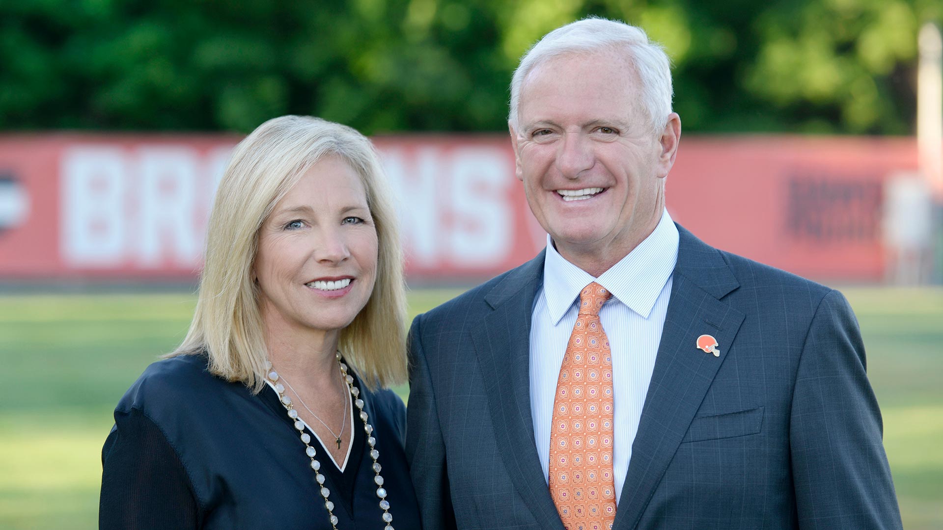 A man and women smiling for a photo.